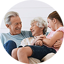 Grandparents hugging their granddaughter - Free Health Insurance Quote - Salinas, CA